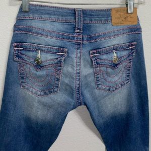 True Religion skinny jeans w/ pink stitch. Size 27
